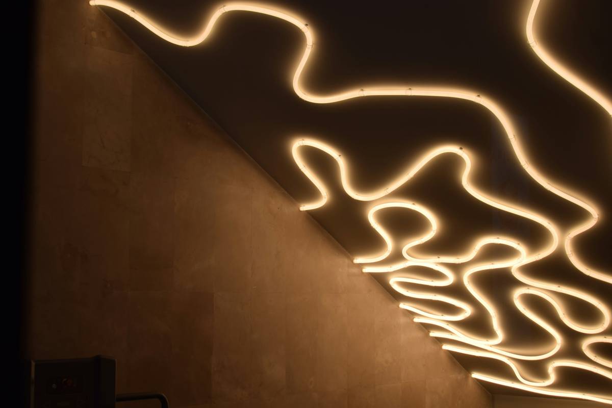 Smart app interface controlling updated mood lighting for living room with scheduled scenes